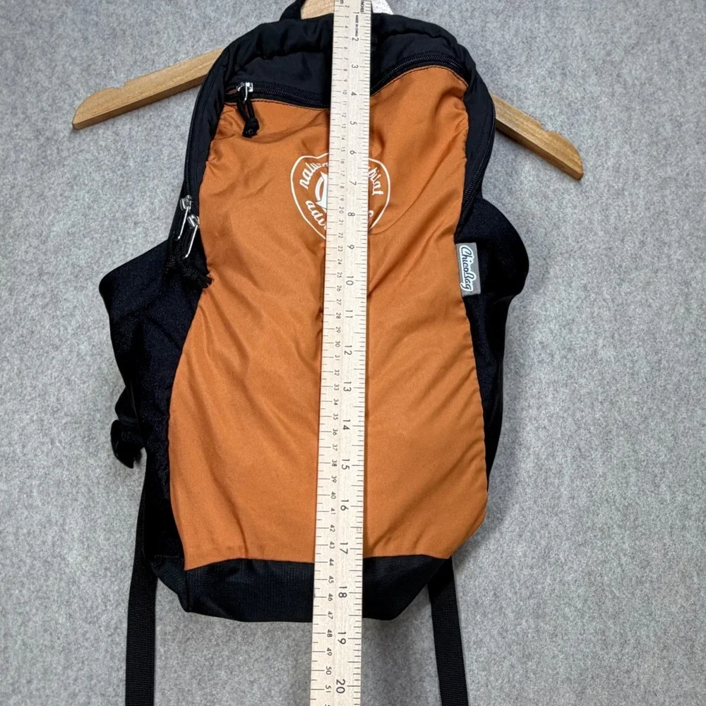 ChicoBag Natural Habitat Adventures Travel Pack Recycled Orange Black Backpack